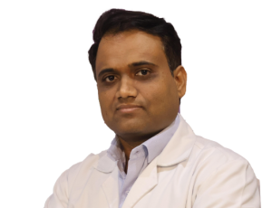 Dr. Yashwant T - Pathway Hospital Portrait of a male doctor in a white lab coat against a white background.